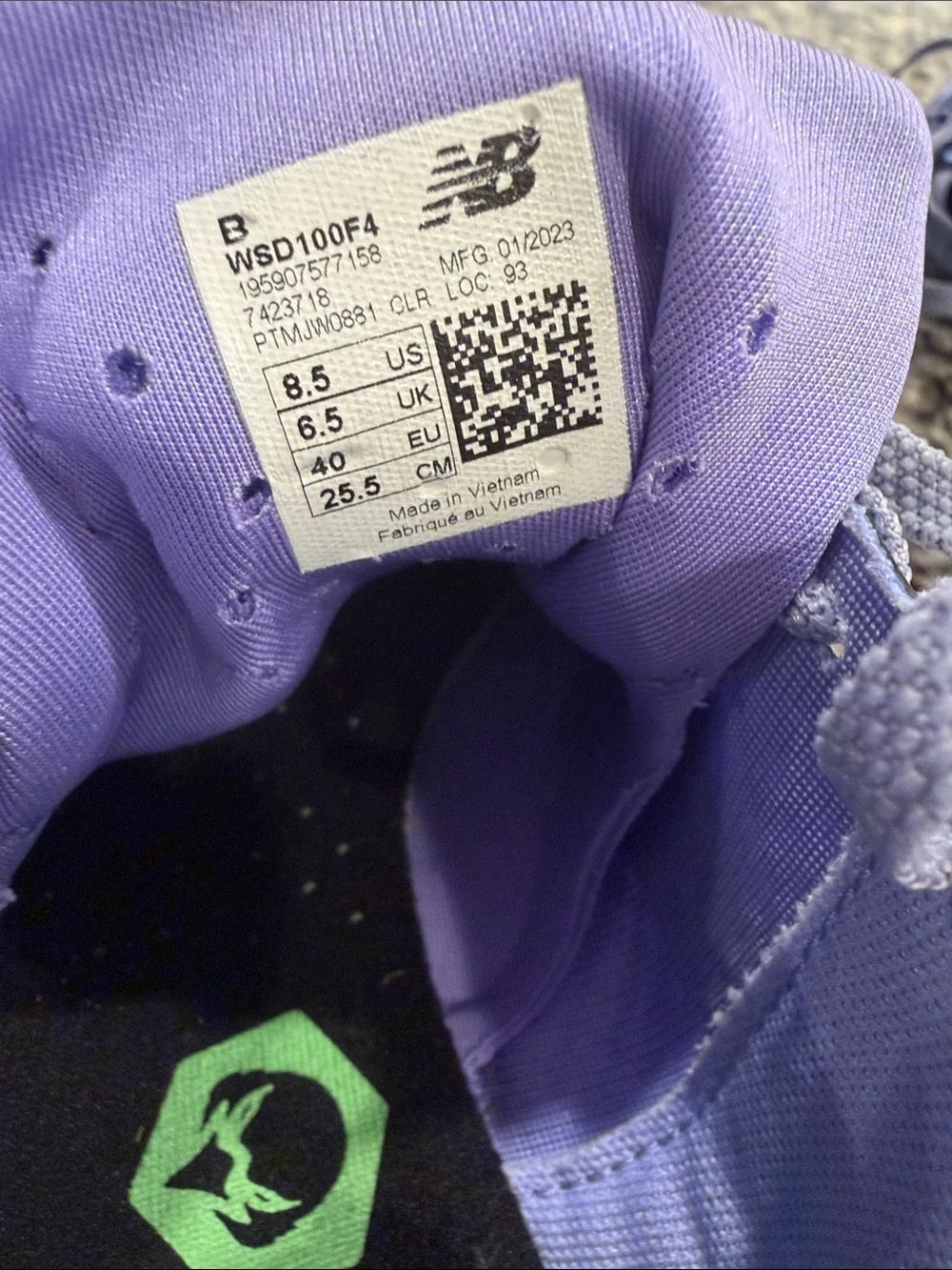 New Balance running spikes with Bright Green Logo